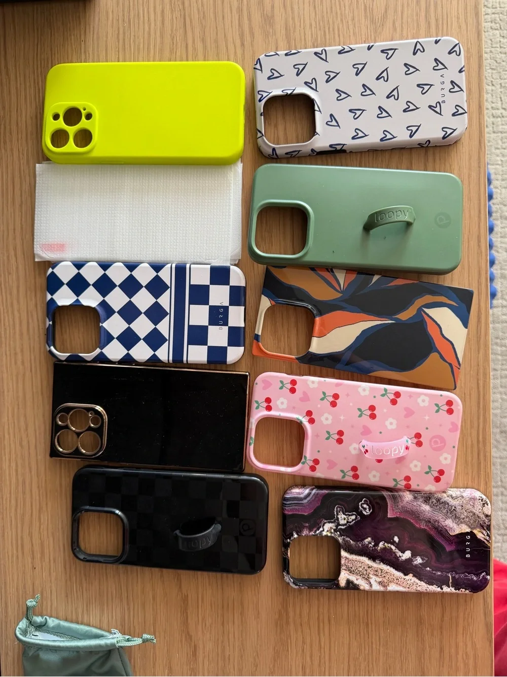 9 iPhone 15 pro max cases and a few screen protectors